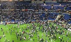 Pese a los disturbios el Lyon se impone  en la Europa League