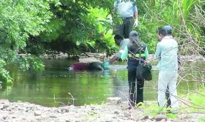 Encontraron cadver flotando en un Rio