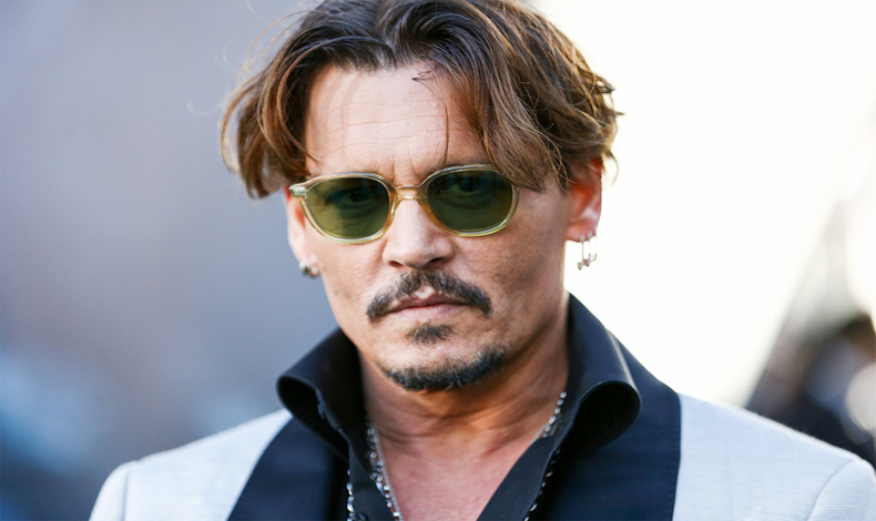 Johnny Deep denuncia que lo estafaron