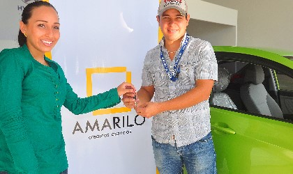 Amarilo premia a ganador del Rumbn Inmobiliario