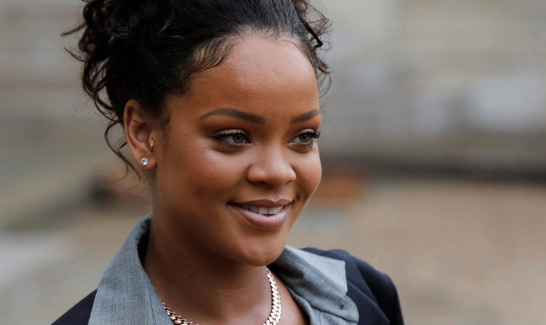 As reaccion Rihanna al conocer al presidente de Francia