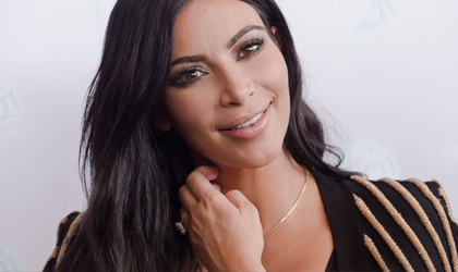 Kim Kardashian podría someterse a cirugía para tener un tercer bebé