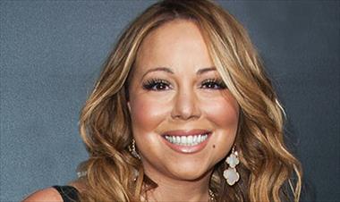 /vidasocial/mariah-carey-es-feliz-mientras-escribe-en-su-estudio/40543.html