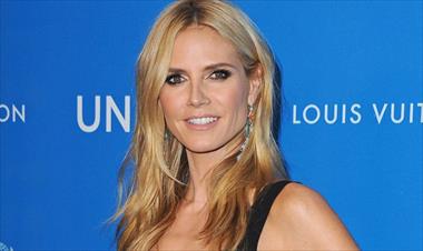 /vidasocial/heidi-klum-presume-su-cuerpo-en-topless/60623.html