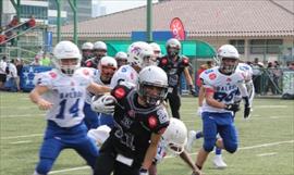 As va la Liga Kiwanis del football americano